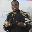 Sean Kingston posing for a photo at a red carpet event. Sean Kingston posing for a photo at a red carpet event.