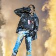 Travis Scott performing at the Astroworld Festival amid dramatic stage effects. Travis Scott performing at the Astroworld Festival amid dramatic stage effects.