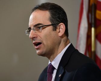 Colorado Attorney General Phil Weiser speaking at a press conference regarding the investigation into Elijah McClain's death.