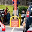Cars lined up at a gas station with people refueling after the Colonial Pipeline cyberattack, indicating fuel shortages. Cars lined up at a gas station with people refueling after the Colonial Pipeline cyberattack, indicating fuel shortages.