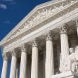 Image of the United States Supreme Court building, showcasing its neoclassical architecture and large columns against a blue sky. Image of the United States Supreme Court building, showcasing its neoclassical architecture and large columns against a blue sky.
