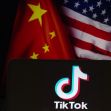 Logo of TikTok displayed in front of the flags of China and the United States. Logo of TikTok displayed in front of the flags of China and the United States.