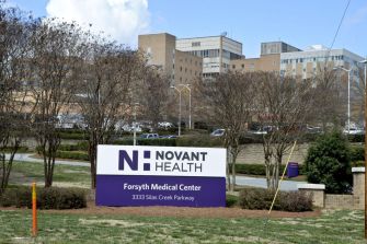 Sign for Novant Health at Forsyth Medical Center, displaying the center's address.