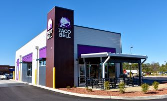 Exterior of a Taco Bell restaurant showcasing its distinctive branding and design.