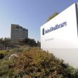 Sign for UnitedHealthcare building surrounded by landscaping. Sign for UnitedHealthcare building surrounded by landscaping.