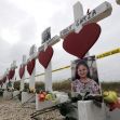 Memorial crosses with photographs and flowers honoring the victims of the Texas church shooting. Memorial crosses with photographs and flowers honoring the victims of the Texas church shooting.