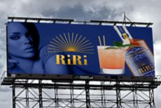 promotional materials for RiRi rum showing Rihanna on a billboard